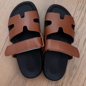 Brand new never worn brown Hermes-like sandals.